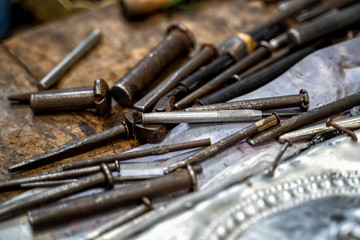 Silversmiths tools on the silver workplace