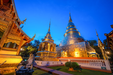 Fototapeta premium Famous Temple in Blue sky twilight time. Beautiful traditional architecture at Temple of Chiangmai Thailand, Asia..