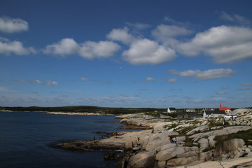 People standing on the edge of the shore