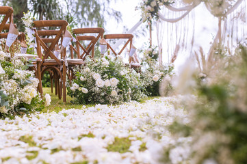 Wedding ceremony. Arch, decorated with flowers.