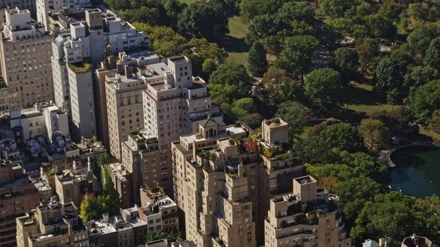 NYC New York Aerial v121 Short panning birdseye view of Central Park Conservatory Water and Upper East Side residential - October 2017
