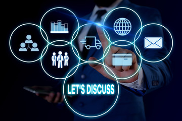 Text sign showing Let S Discuss. Business photo showcasing asking someone to talk about something with demonstrating or showing Male human wear formal work suit presenting presentation using smart