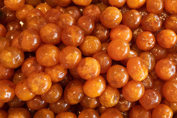 orange candied mandarin fruits background