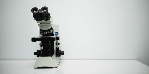 Fototapeta na wymiar microscope isolated on white background