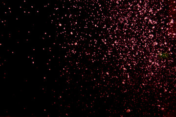 Abstract dust explosion on a black background