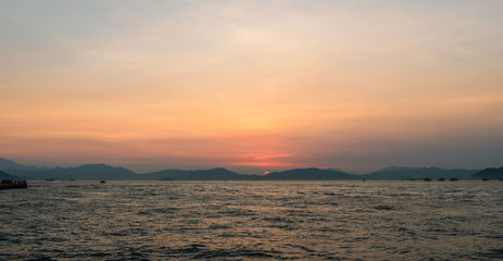 Fototapeta na wymiar Sunset over the Lantau Island viewed from the West Ring of Hong Kong Island, Hong Kong.