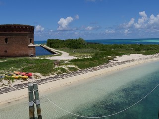 Scenic view of the ocean with one side of Fort Jefferson protected by a moat at the Dry Tortugas...