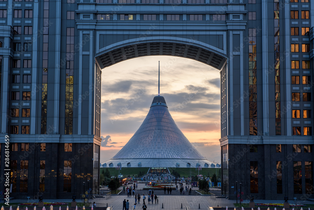Wall mural nur-sultan, kazakhstan, august 2019, tall buildings and attractions at dusk. - Wall murals