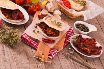Tigella bread with sun-dried tomatoes. 