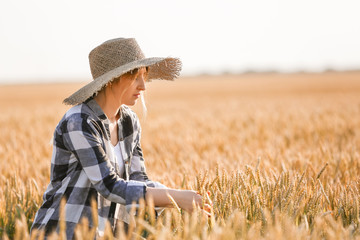 Farmer in field on sunny day