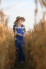 Farmer in field on sunny day