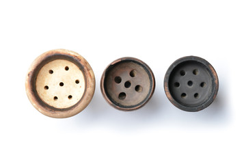 Bowls for hookah tobacco, clay bowls on a white background
