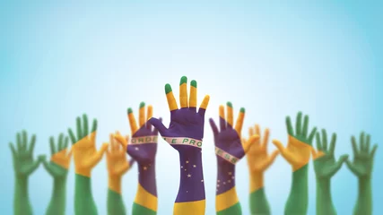 Cercles muraux Brésil Drapeau du Brésil sur les mains des gens se levant pour le bénévolat, le vote, l& 39 aide recherchée et la célébration de la fête nationale priant pour le pouvoir brésilien isolé sur fond de ciel bleu (chemin de détourage)