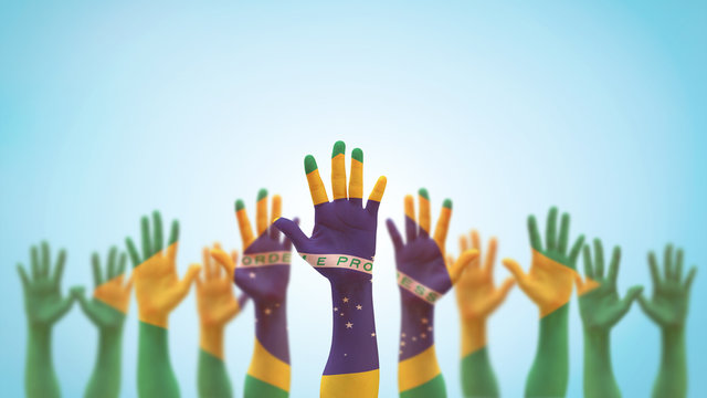 Brazil flag on people palm hands raising up for volunteer, voting, help wanted, and national holiday celebration praying for Brazilian power isolated on blue sky background (clipping path)