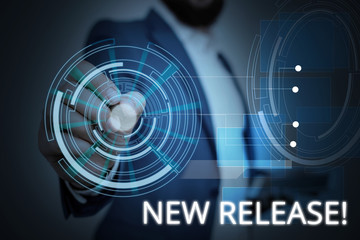 Writing note showing New Release. Business concept for announcing something newsworthy recent...