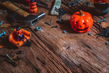 Happy Halloween day with construction DIY handy tools on rusty wooden background concept with copy...