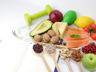 Healthy eating of ketogenic diet meal plan  apple,salmon and avocado with Workout and fitness...