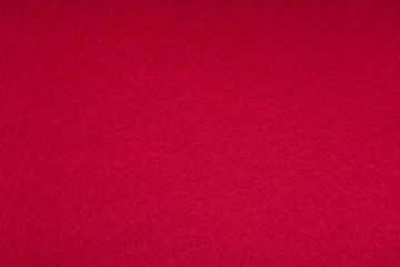 Soft texture of the fabric in bright red. High resolution photo. felt, fleecy textile