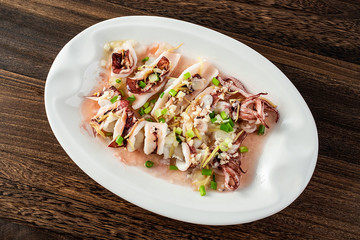 Chinese Cantonese cuisine, a dish of garlic, steamed squid