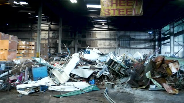 Tin and steel cans, aluminum, and sheet metal in a recycling plant