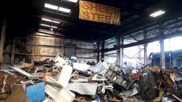 Tin and steel cans, aluminum, and sheet metal in a recycling plant