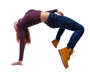 Side view of a woman dancing ballet. girl is balancing.