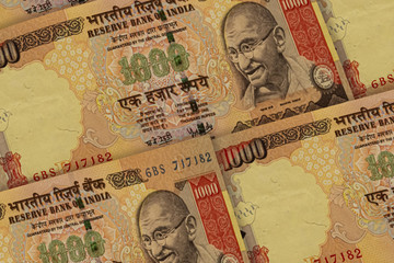 Indian rupees banknotes background. 1000 INR