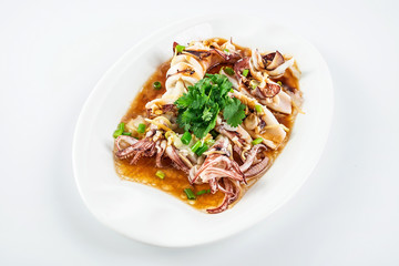 Chinese Cantonese cuisine home cooking, a dish of garlic steamed tubule squid on a white background