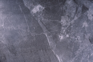 Gray marble texture. Natural patterned stone for background, copy space and design. Abstract marble stone surface.