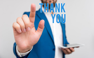 Conceptual hand writing showing Thank You. Concept meaning a polite expression used when...