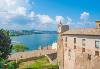 Fototapeta premium Capodimonte (Italy) - A little old town on Bolsena lake with fortress and suggestive beach and water front; province of Viterbo, Lazio region