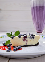 cheesecake with fresh blueberries and mint