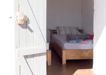 Fototapeta na wymiar Old wooden bed (dormitory)