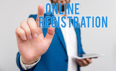 Conceptual hand writing showing Online Registration. Concept meaning System for subscribing or registering via the Internet Businessman with pointing finger in front of him
