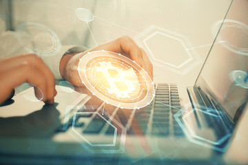 Blockchain theme hud with man working on computer on background. Concept of crypto chain. Double...