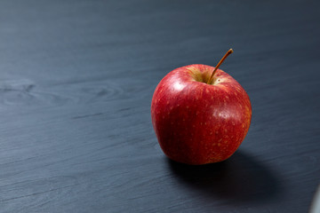 fresh apple on the black background