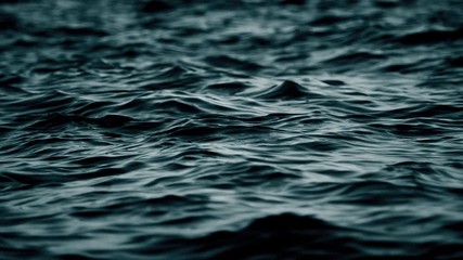 Black waves. Abstract black liquid. Slow motion.