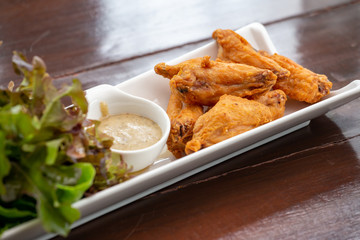 Fried Chicken, Sauce and Organic Vegetables, Beautifully decorated in white plate
