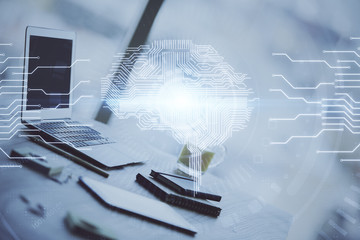 Double exposure of desktop with computer and brain drawing hologram. Artificial intelligence...