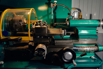 Metalworking technology. Lathe drilling machine close-up. Industrial theme.