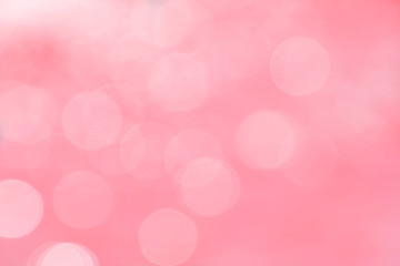 Blurred and defocused background and wallpaper of pool water bokeh and bubbles in rose pink pastel...