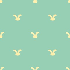 Cute seamless background with yellow bunnies pattern . Seamless designfor fabric, cover, banner, interior, children's clothing, print for packaging cosmetics, gift packaging