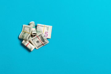 Many Stack of 100 dollar bills. Isolated on colored background top wiev with copy space