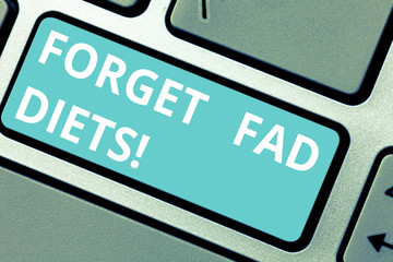 Conceptual hand writing showing Forget Fad Diets. Business photo showcasing drop pounds due unhealthy calorie reduction or water loss Keyboard key Intention to create computer message idea