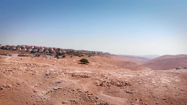 Bedouin Camp Close to Israeli City Maale Adumim Aerial Drone footage over Bedouin outpost Close to Israeli City Maale Adumim Aerial
