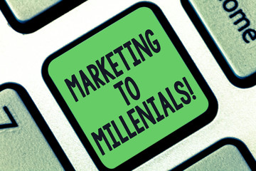 Conceptual hand writing showing Marketing To Millenials. Business photo text Be socially connected Internet savvy and stay mobile Keyboard key Intention to create computer message idea