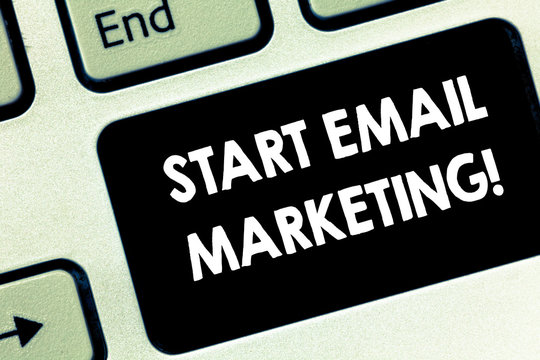 Conceptual hand writing showing Start Email Marketing. Business photo text Use of email to promote products andoror services Keyboard key Intention to create computer message idea
