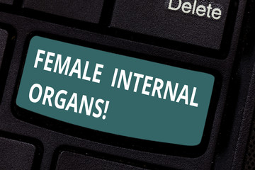 Text sign showing Female Internal Organs. Conceptual photo The internal genital structures of the Keyboard key Intention to create computer message pressing keypad idea