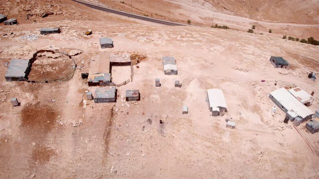 Bedouin Camp Close to Israeli City Maale Adumim Aerial Drone footage over Bedouin outpost Close to Israeli City Maale Adumim Aerial