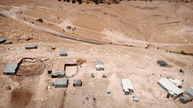 Bedouin Camp Close to Israeli City Maale Adumim Aerial Drone footage over Bedouin outpost Close to Israeli City Maale Adumim Aerial